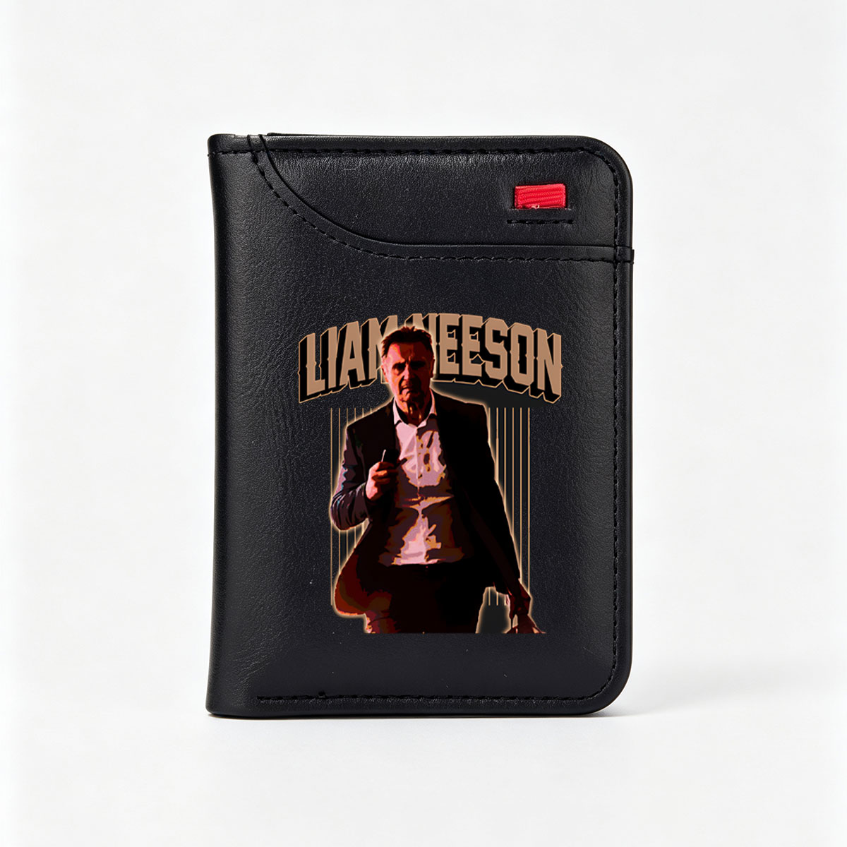 Liam Neeson in a dramatic pose, holding a phone, with bold text above him. - Vertical Style Wallet