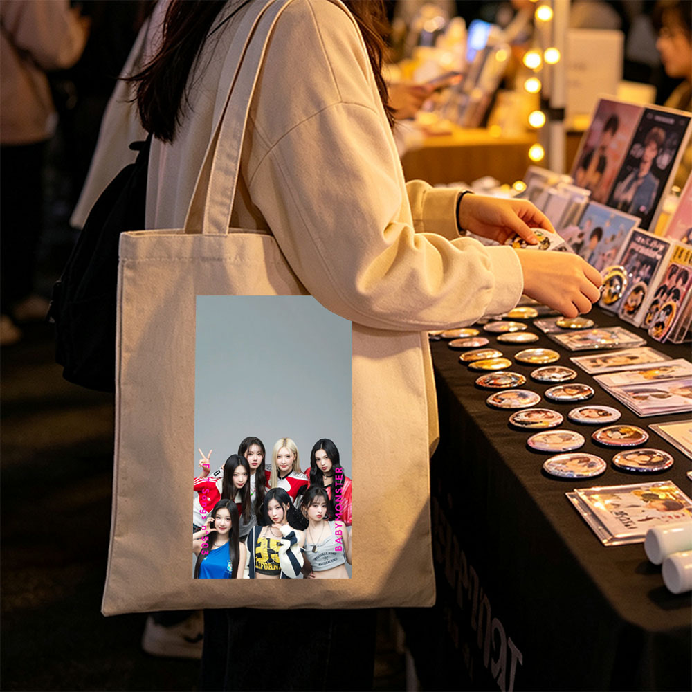 BABYMONSTER Group Photo - Seven Members Posing in Casual Outfits with Playful Expressions and Hand Gestures - Canvas tote bags