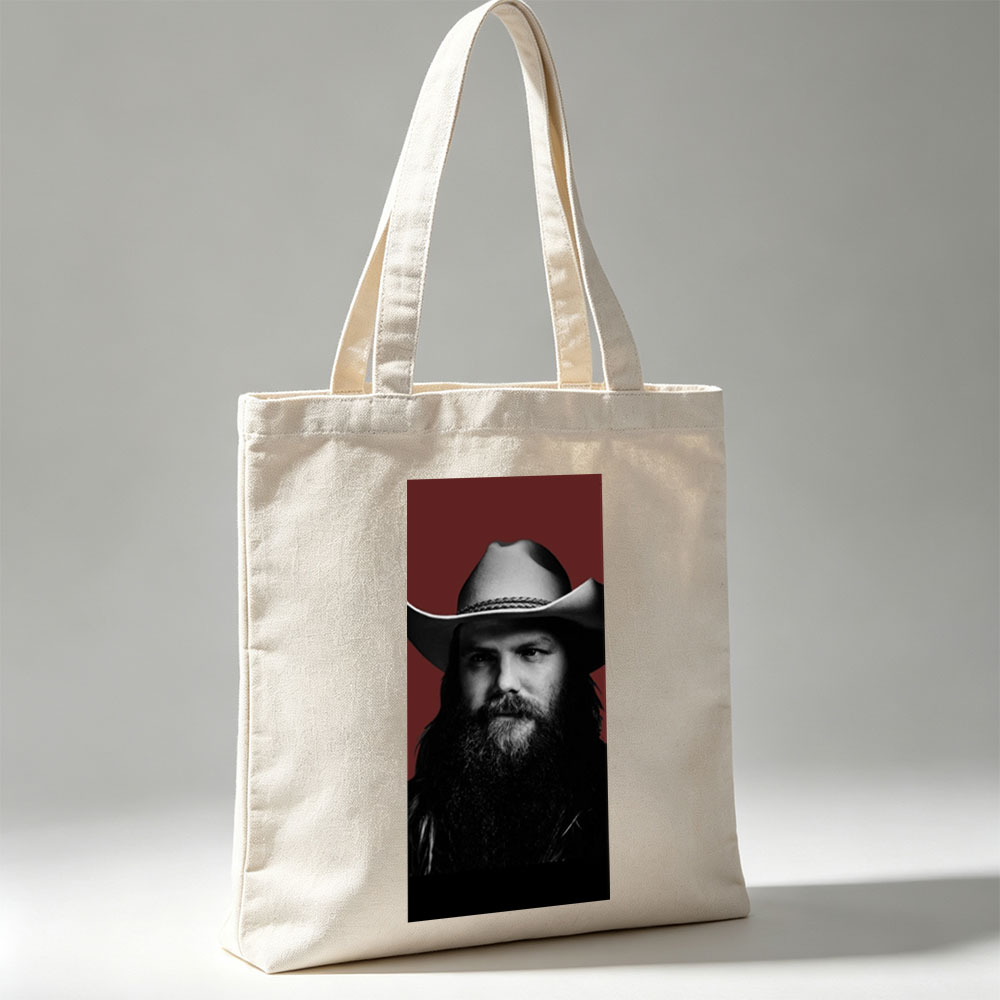 Chris Stapleton in a Cowboy Hat with a Bearded Portrait Against a Red Background - Canvas tote bags