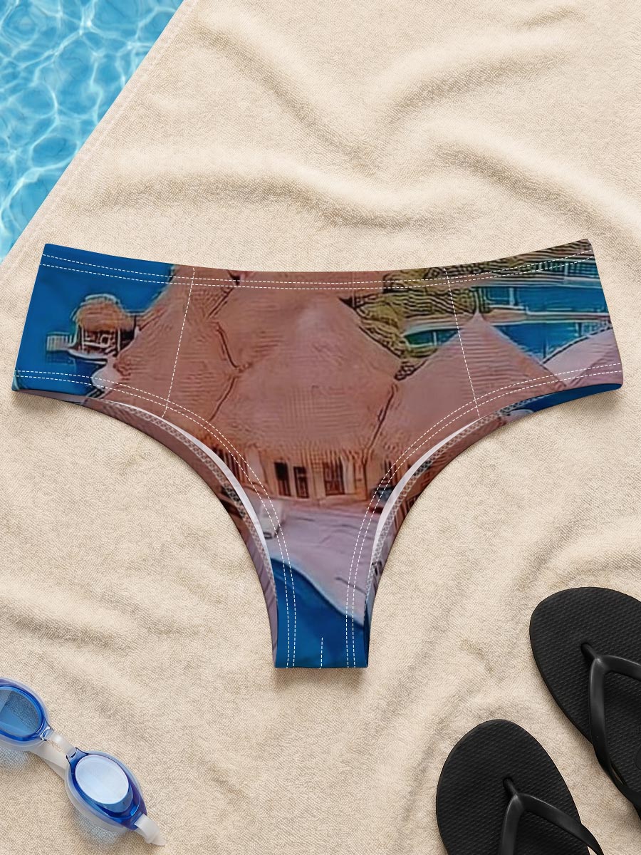 Overwater bungalows with private pools on a tropical island, surrounded by crystal blue waters and lush greenery. -  Men's swim trunks