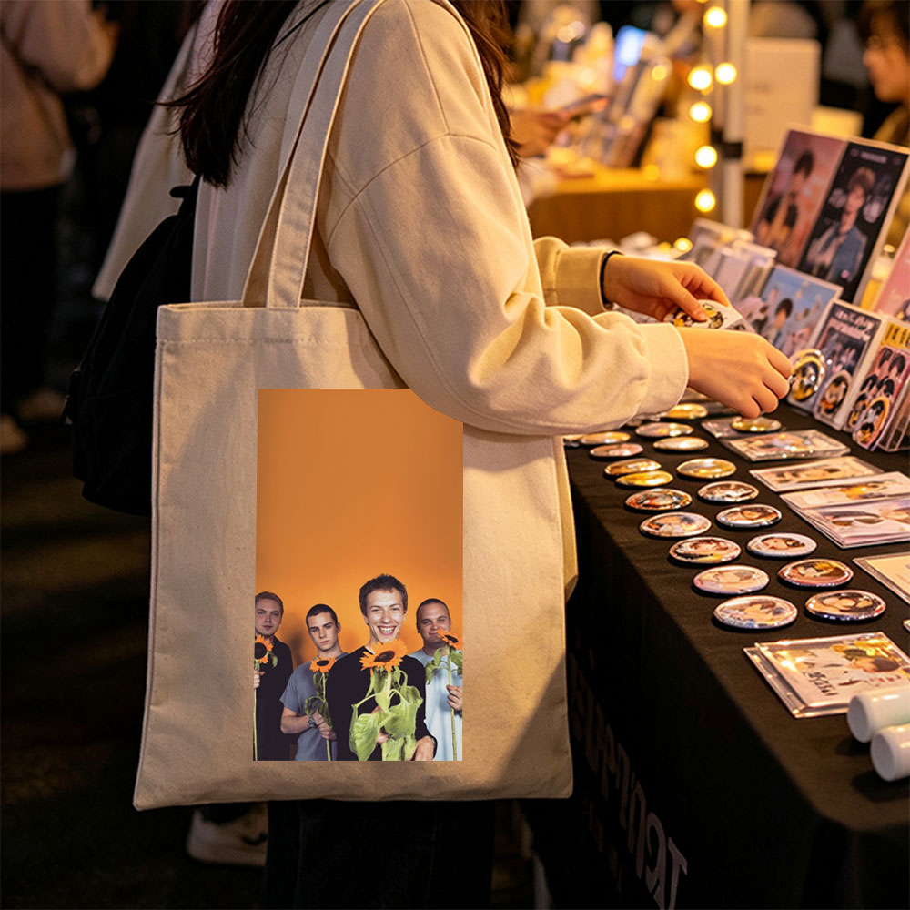 Imagine Dragons Band Members Holding Sunflowers Against Orange Background - Canvas tote bags