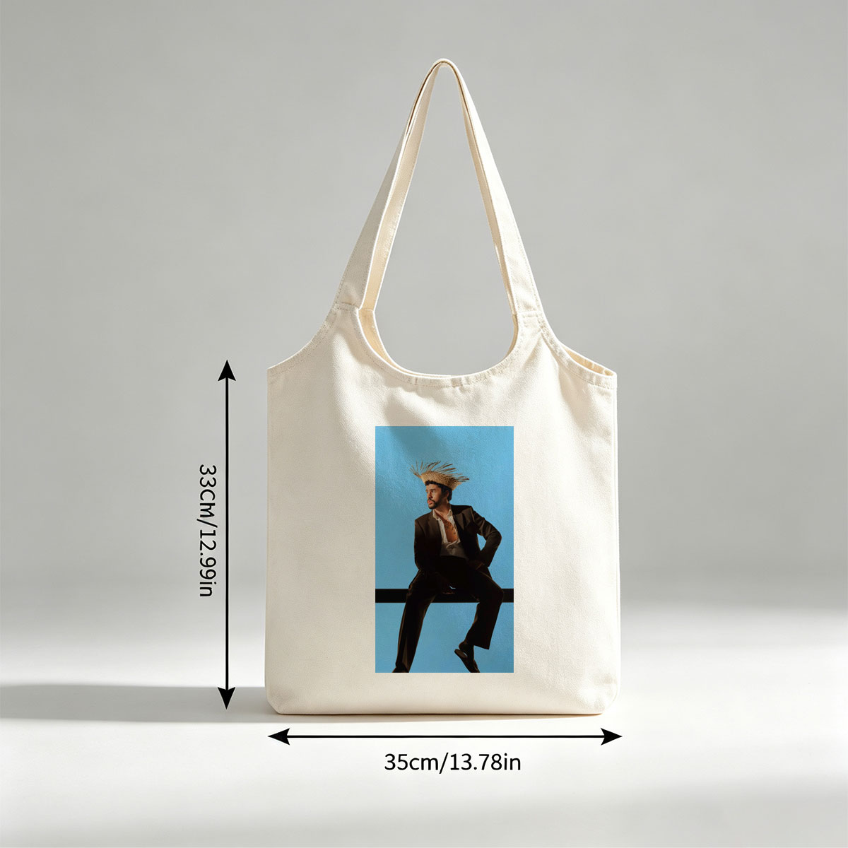 Bad Bunny in a Bold Fashion Statement Wearing a Straw Hat and Suit Against a Blue Background - Canvas shoulder bags/