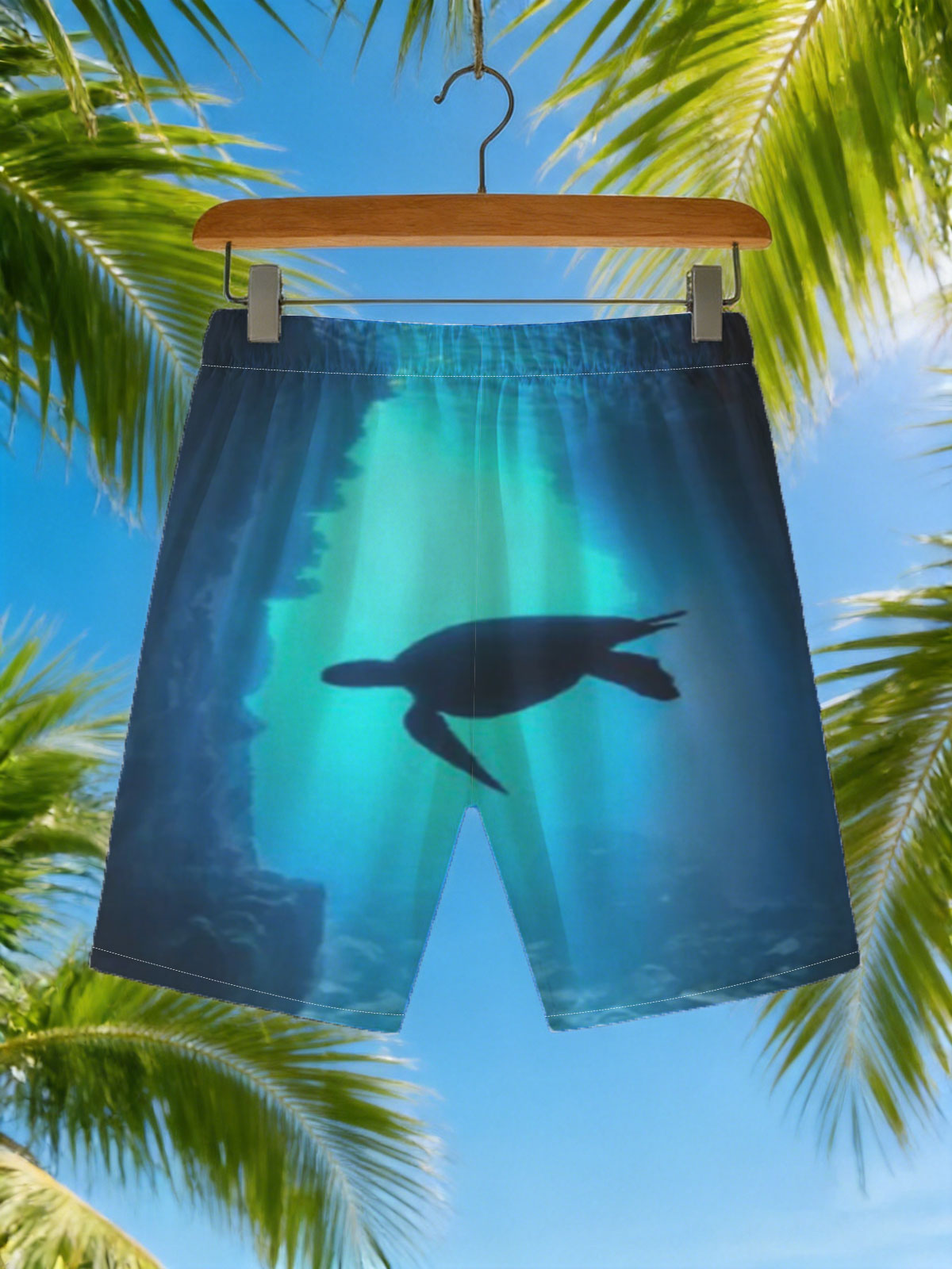 Sea turtle glides through a sunlit underwater cave. -  Beach shorts