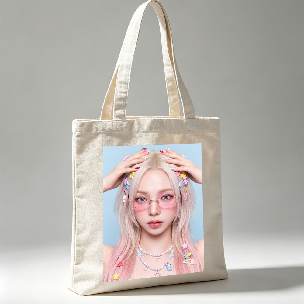 Dami Im in a Pastel-Themed Look with Colorful Hair Clips and Pink Glasses - Canvas tote bags