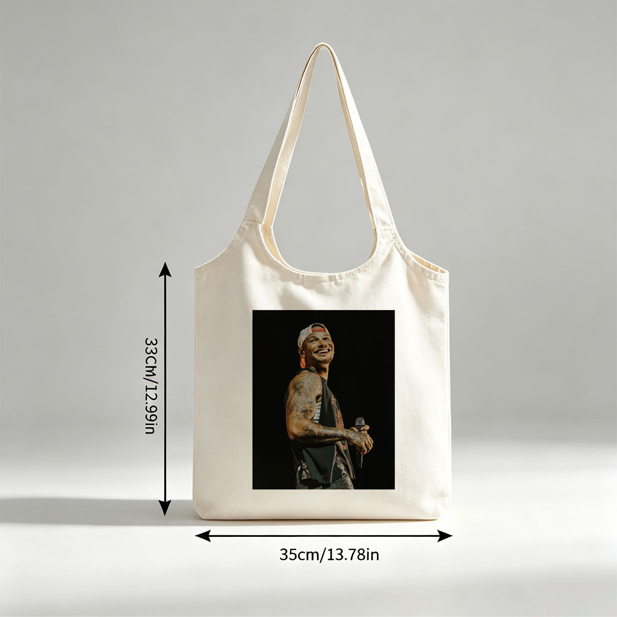 Avicii Performing on Stage with Microphone and Tattooed Arms - Canvas shoulder bags/