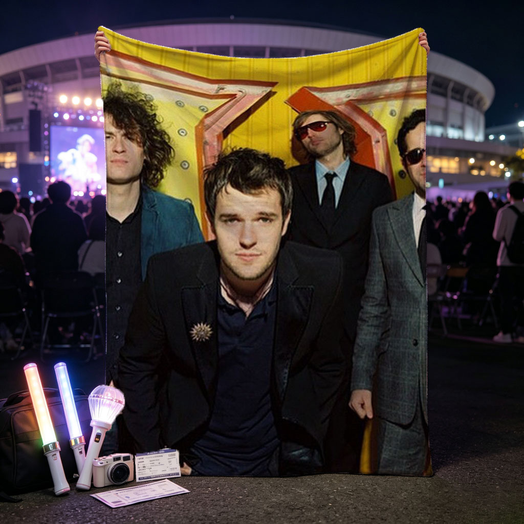 The Killers Band Members in Formal Wear Against a Vibrant Yellow Background - Blankets
