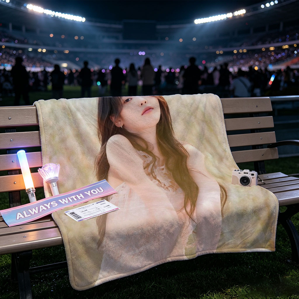 IU in a Serene Field Wearing a Delicate Pink Dress and Sitting Gracefully Amidst Tall Grass - Blankets