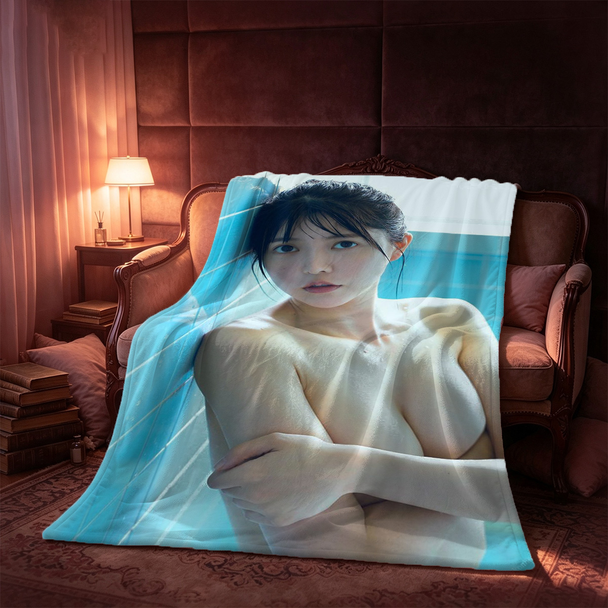 Emma Watson in a short blue satin dress sitting on a leather couch. - Blanket