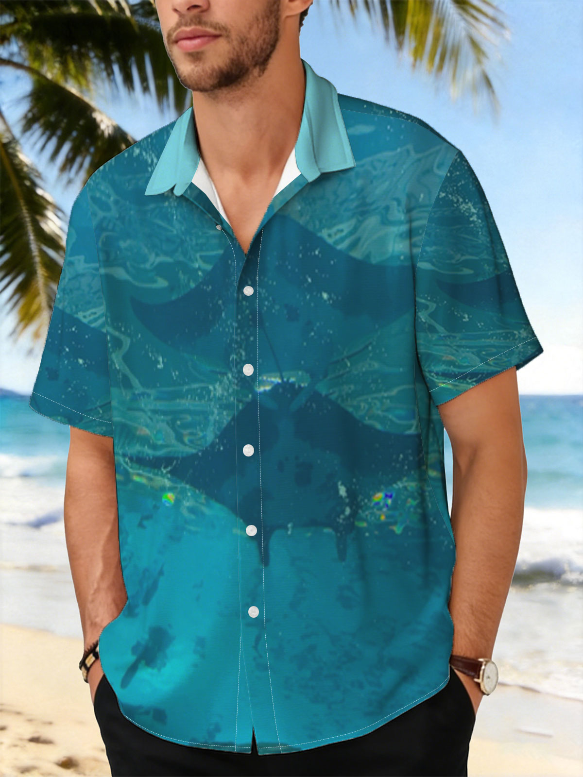 Graceful manta rays glide through clear blue waters, their silhouettes dancing beneath the surface. -  Shirt