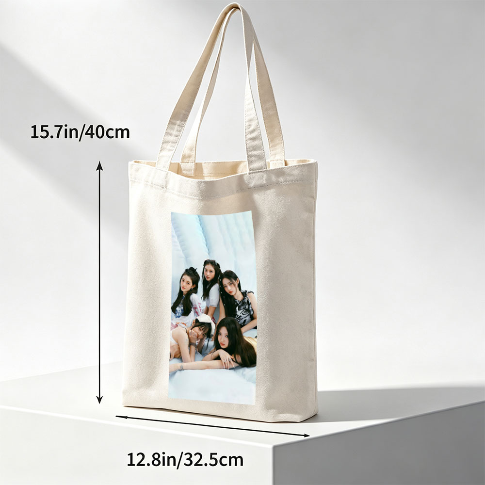 NewJeans Group Photo on Soft Blue Background with Casual Outfits and Relaxed Poses - Canvas tote bags