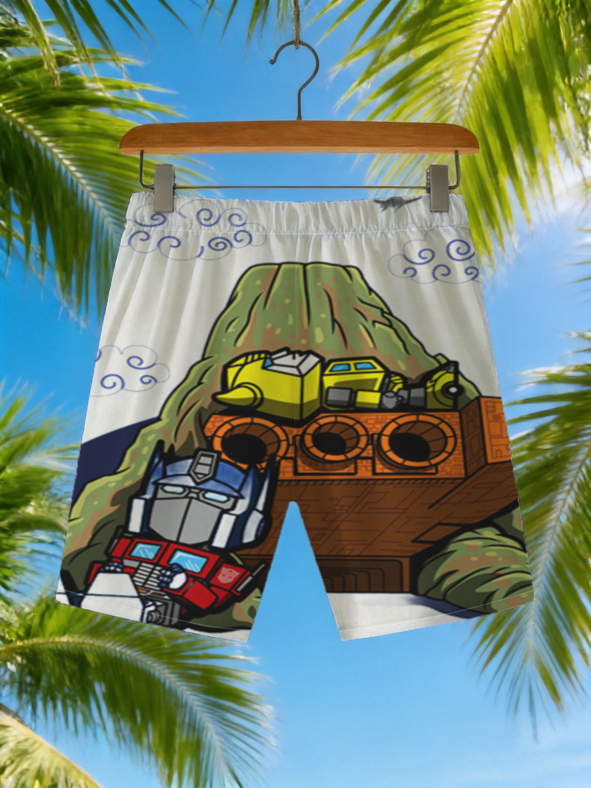 Optimus Prime and Bumblebee atop a mountain with a spaceship, cartoon style -  Beach shorts