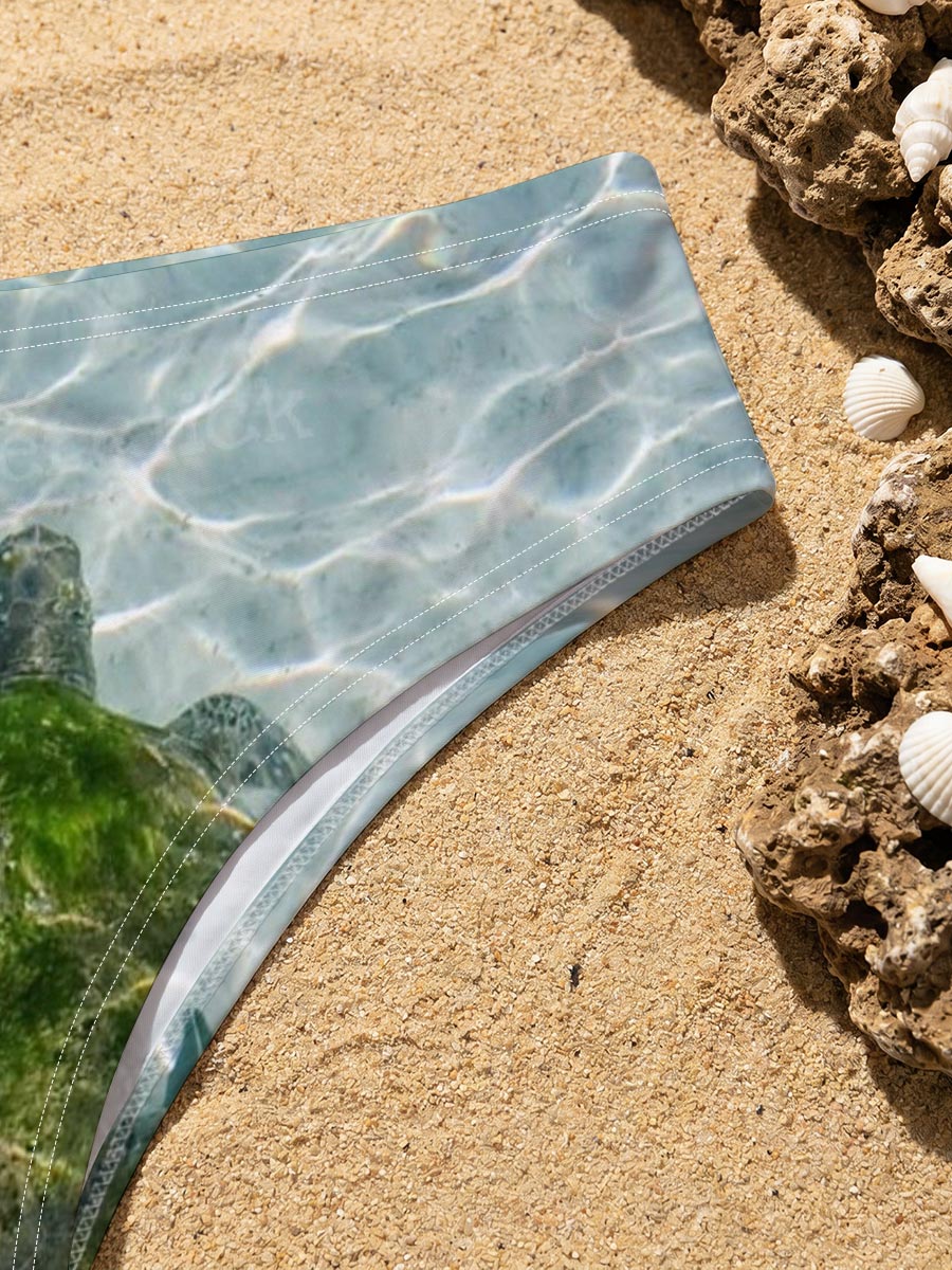 Sea turtle swimming in clear shallow water -  Men's swim trunks