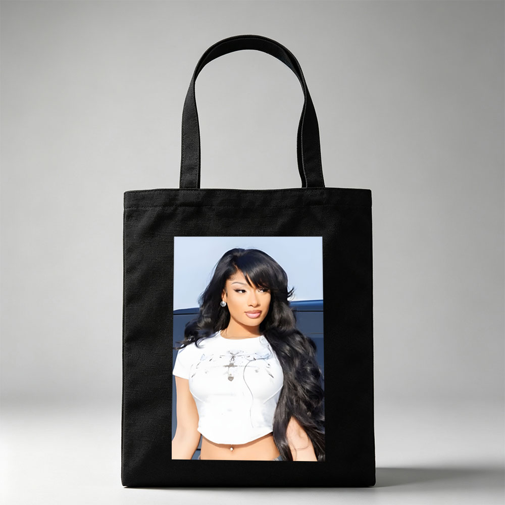 Nicki Minaj in a Stylish White Crop Top with Long Black Hair and Bold Makeup - Canvas tote bags