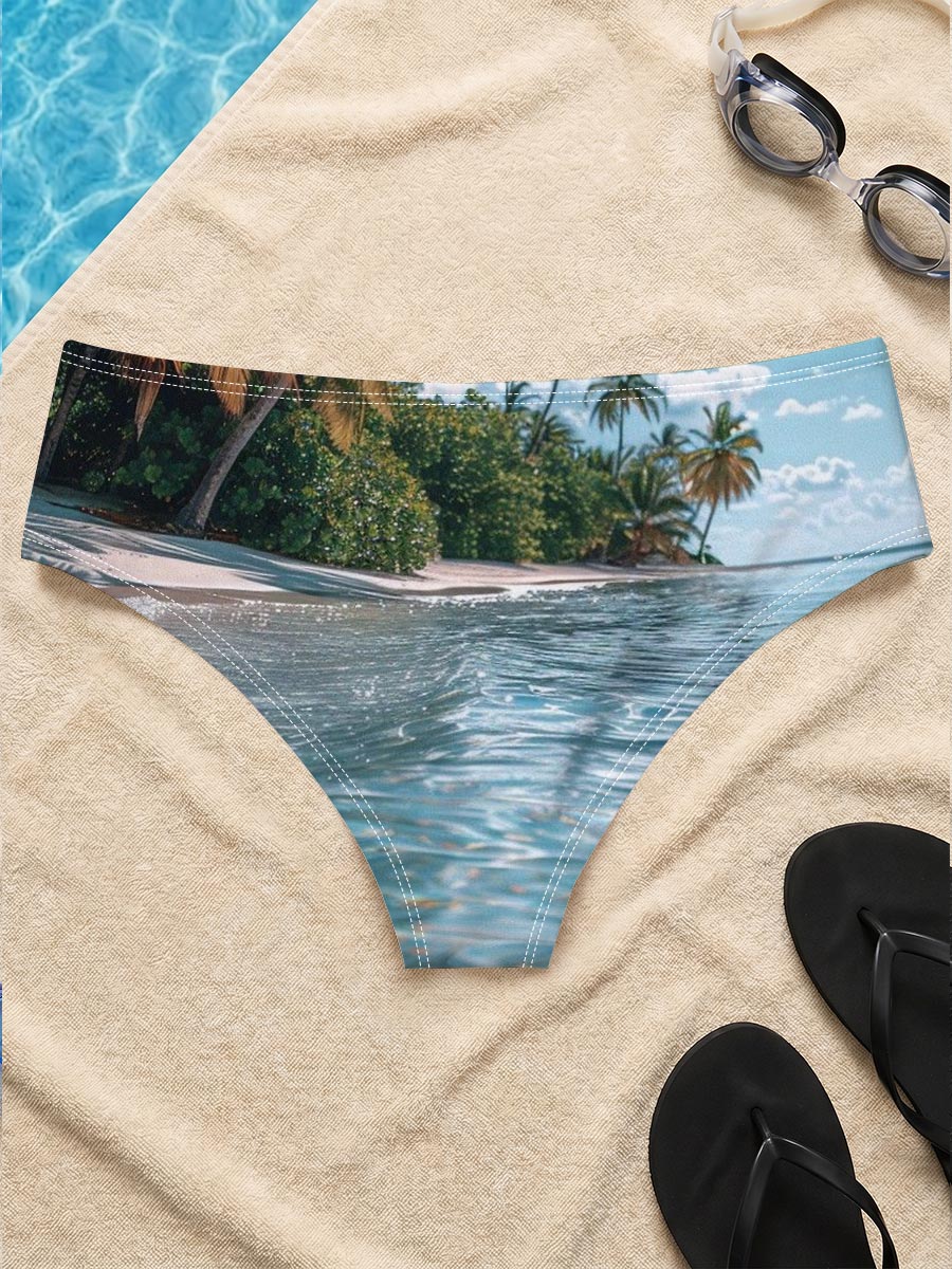 Crystal-clear waters lap against a serene tropical beach lined with swaying palm trees under a bright blue sky. -  Men's swim trunks