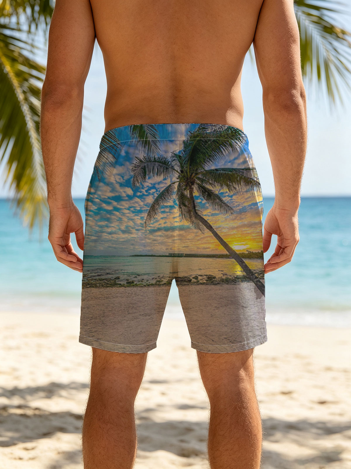 Tropical beach at sunset with palm tree and calm sea -  Beach shorts