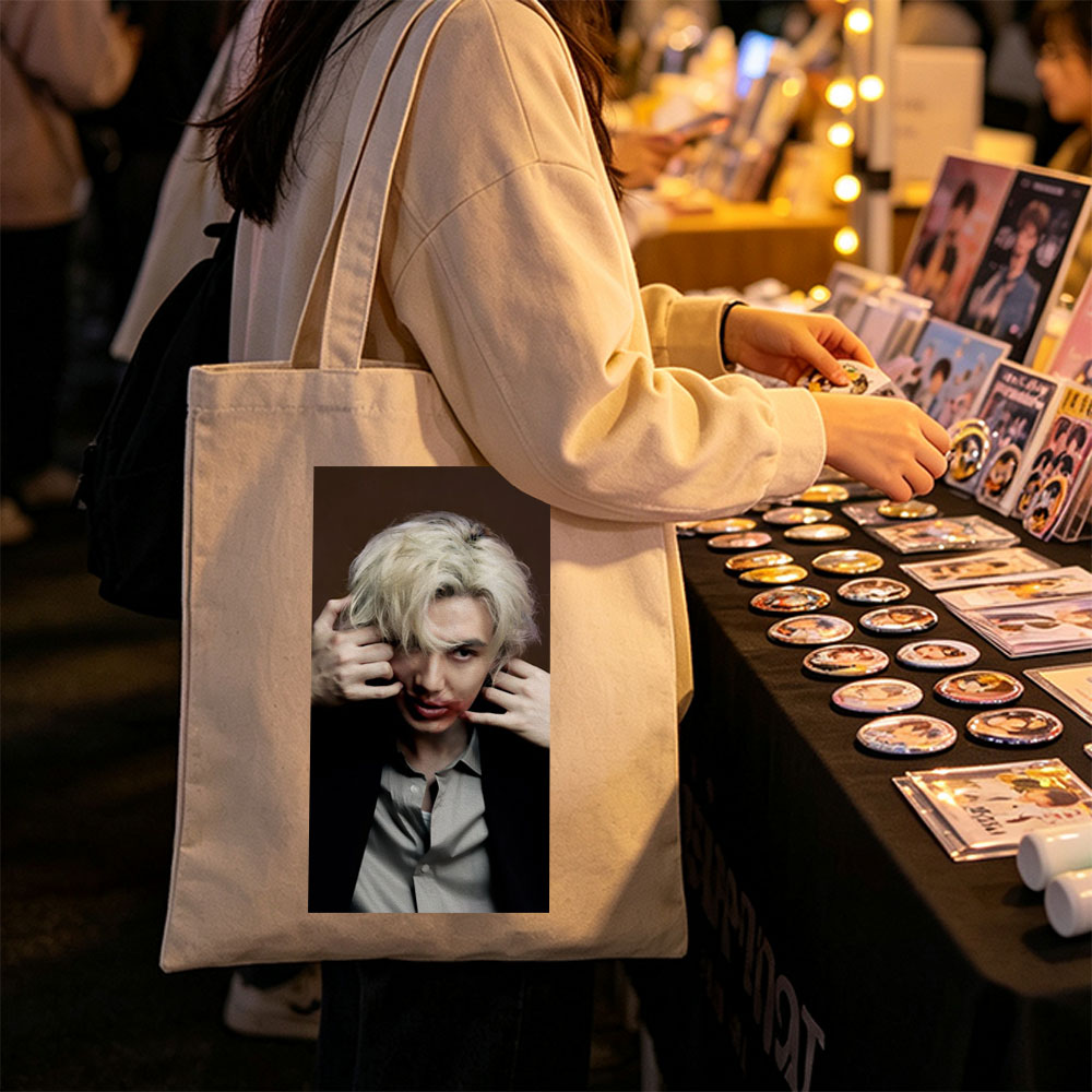 Lisa from BLACKPINK in a Dramatic Close-Up with Platinum Blonde Hair and Intense Expression - Canvas tote bags