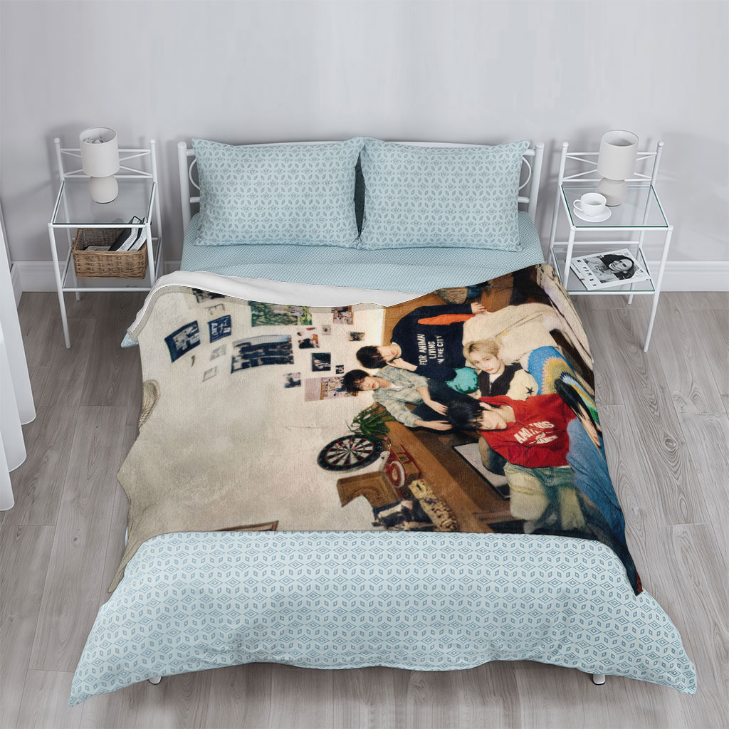 Stray Kids Relaxing in Cozy Living Room with Colorful Blankets and Wall Art - Blankets