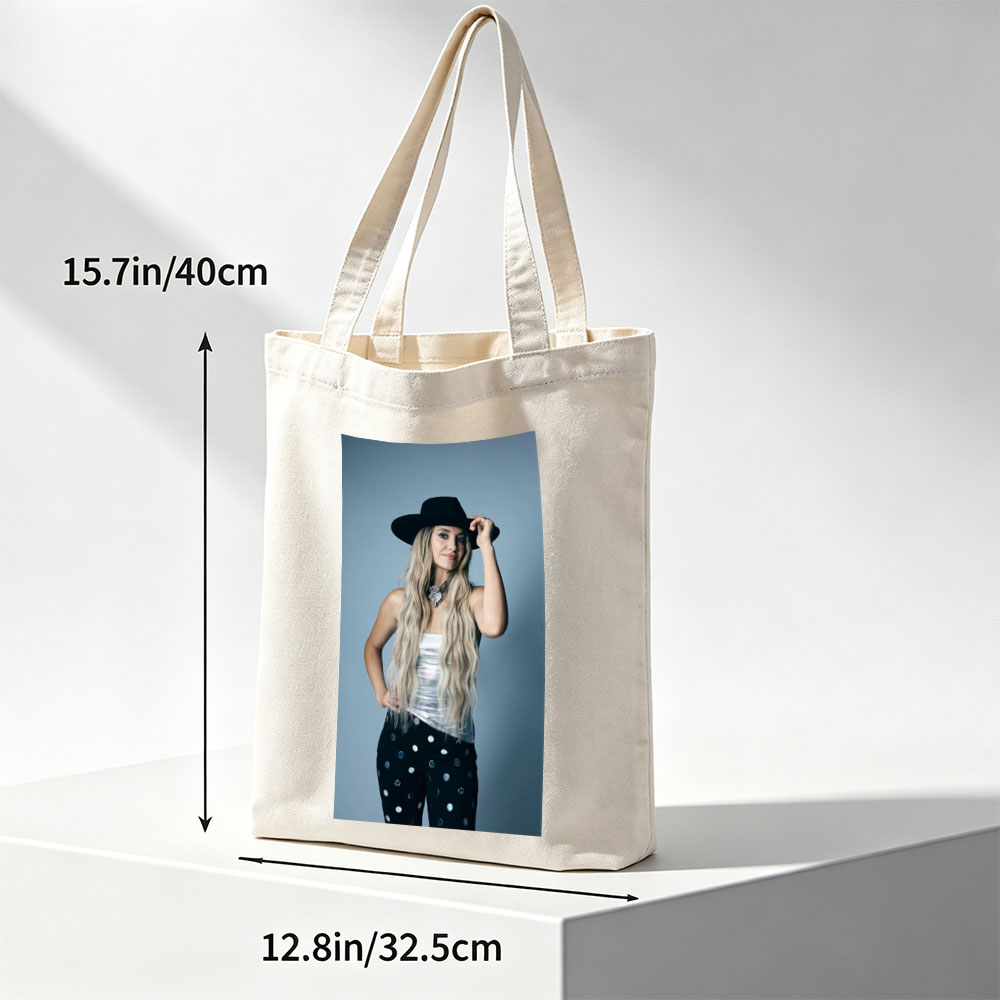 Shania Twain in a Stylish Pose Wearing a Black Hat and Polka Dot Pants - Canvas tote bags