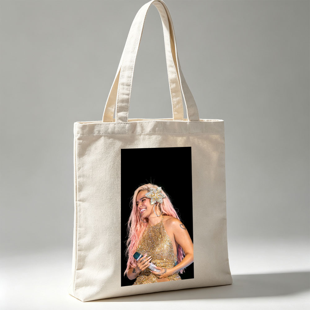 Demi Lovato on Stage in a Sparkling Gold Dress with Pink Hair and Flower Accessory - Canvas tote bags