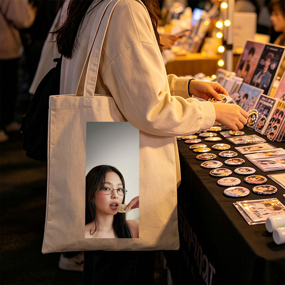 Jennie Kim Eating a Dumpling in a Minimalist Portrait - Canvas tote bags