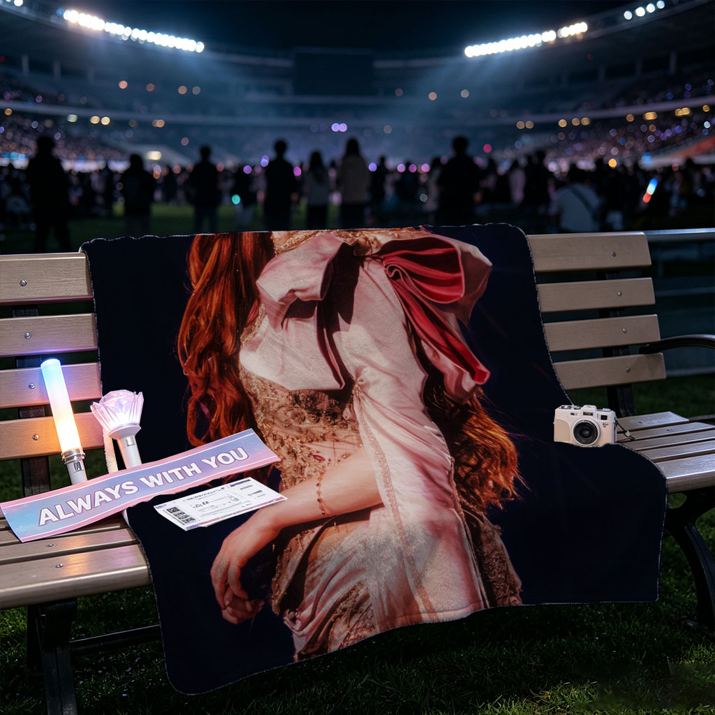 Katy Perry in a Dramatic Performance Scene Wearing a Pink Satin Outfit with Elegant Makeup and Long Red Hair - Blankets