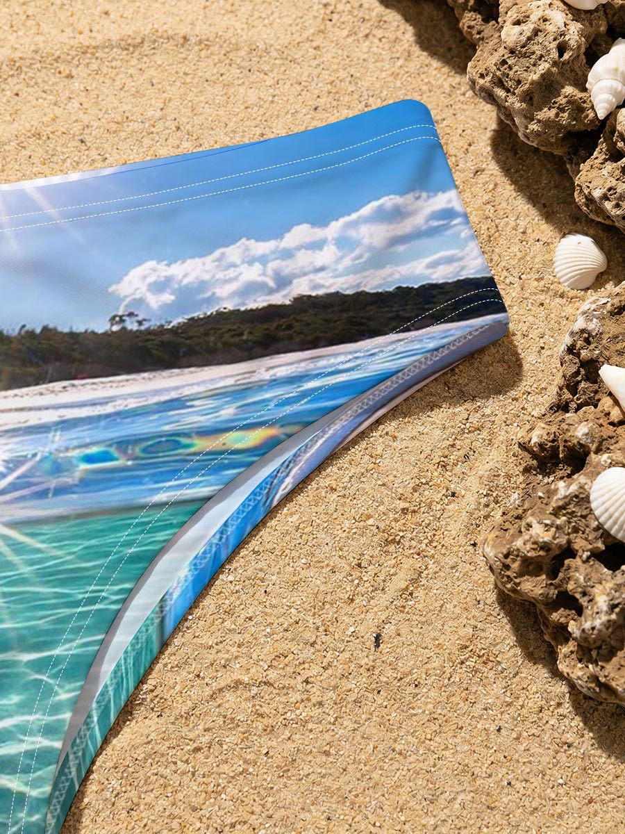 Sunshine Sparkles on Crystal Clear Waters -  Men's swim trunks