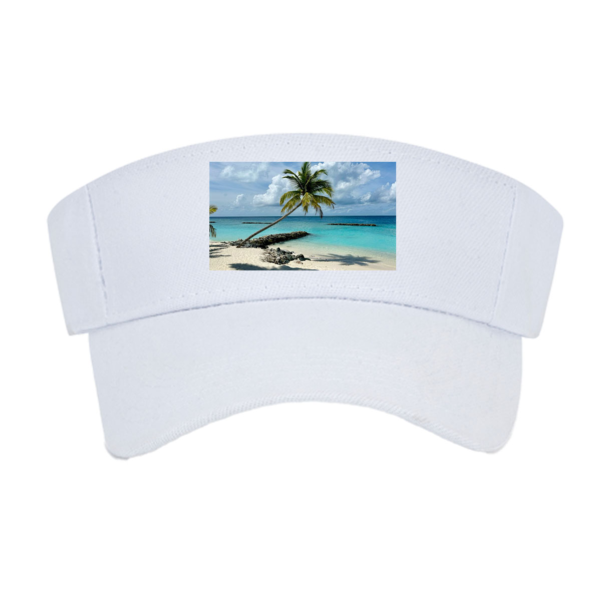 Tropical beach with palm tree leaning over turquoise water and white sand under blue sky. -  Visor cap