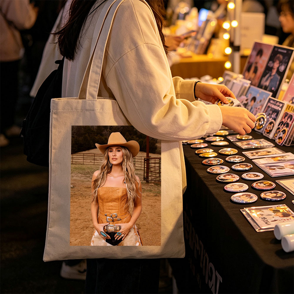 Paris Hilton in Cowboy Chic: Wearing a Tan Hat and Embroidered Corset Outfit on a Ranch - Canvas tote bags