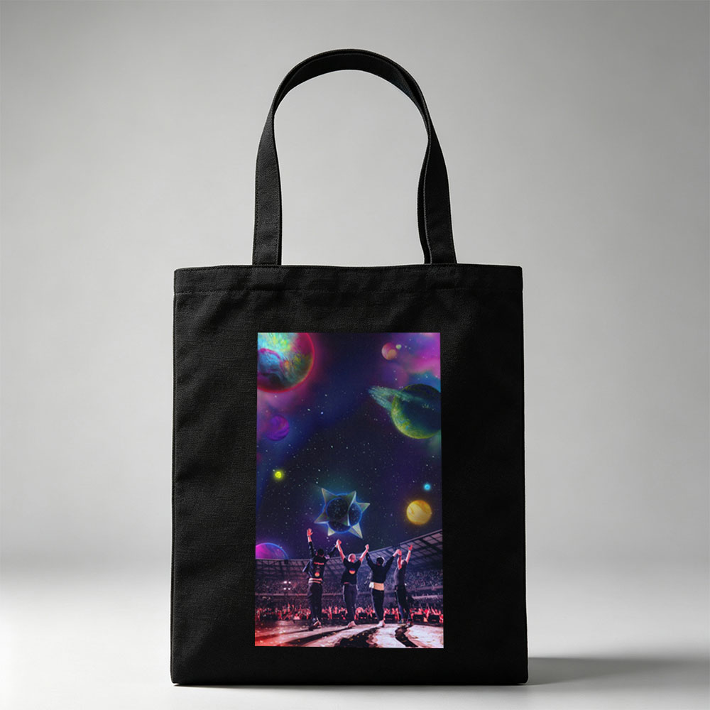 Coldplay Live Performance in a Cosmic Stadium with Vibrant Planets and Starry Sky Background - Canvas tote bags