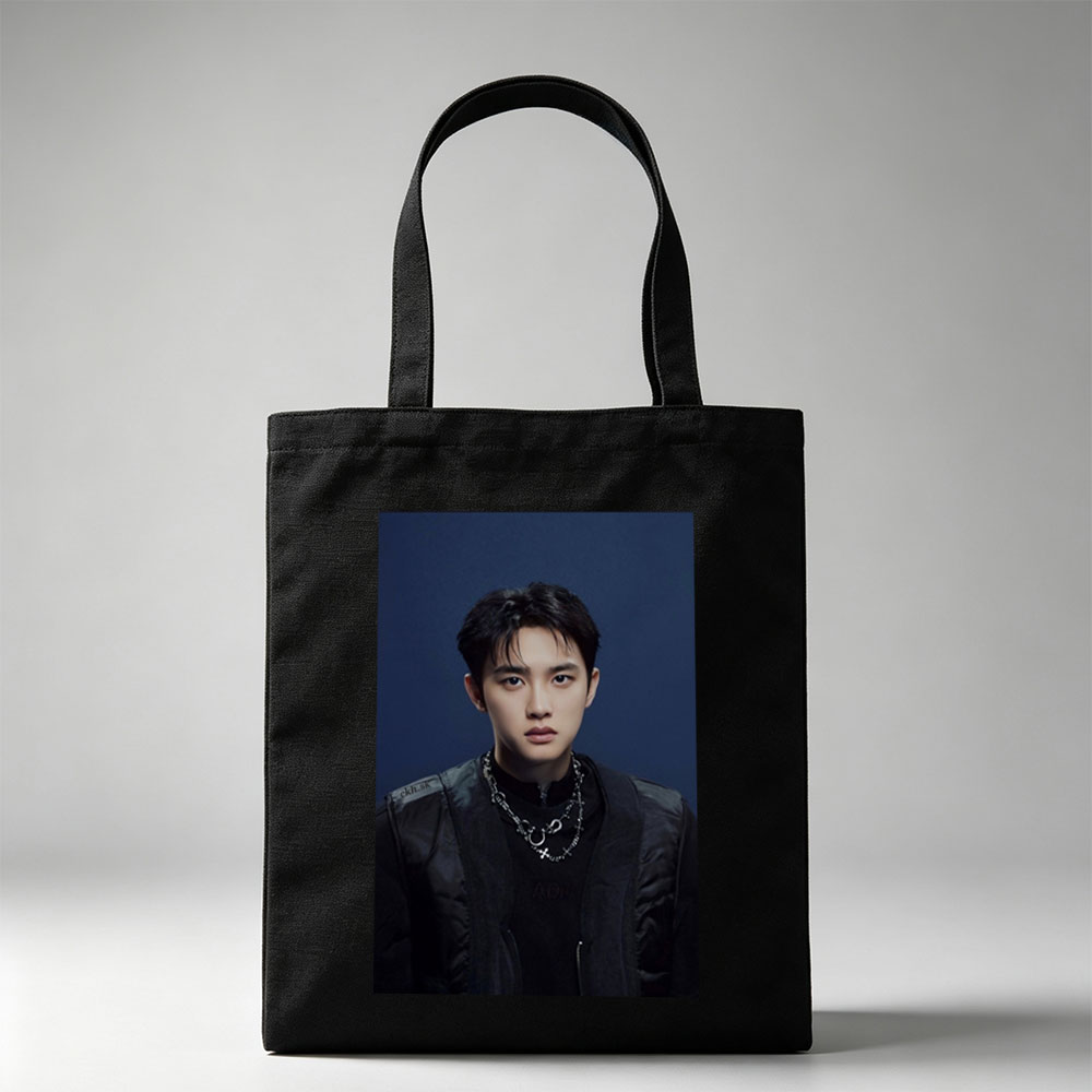 Do Kyung Soo in a Stylish Black Outfit with Layered Necklaces Against a Dark Blue Background - Canvas tote bags