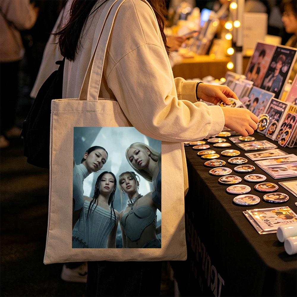BLACKPINK in Futuristic Fashion Scene - Four Members Pose in Sleek, High-Tech Outfits Against a Dramatic, Otherworldly Background - Canvas tote bags