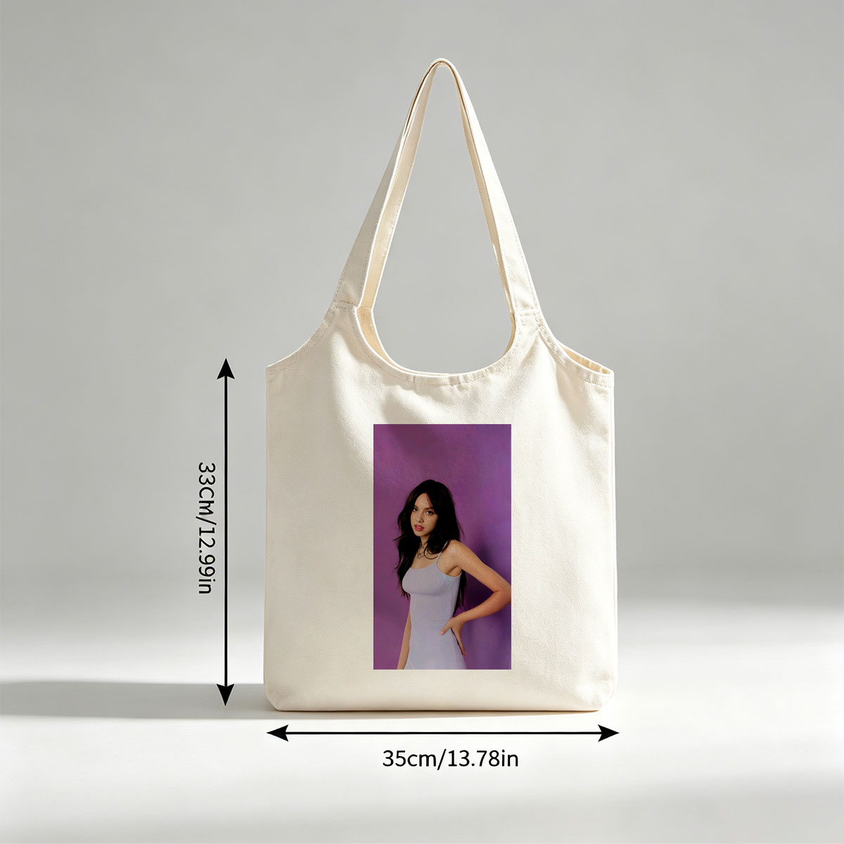 Olivia Rodrigo in a Light Blue Dress Posing Against Purple Background - Canvas shoulder bags/