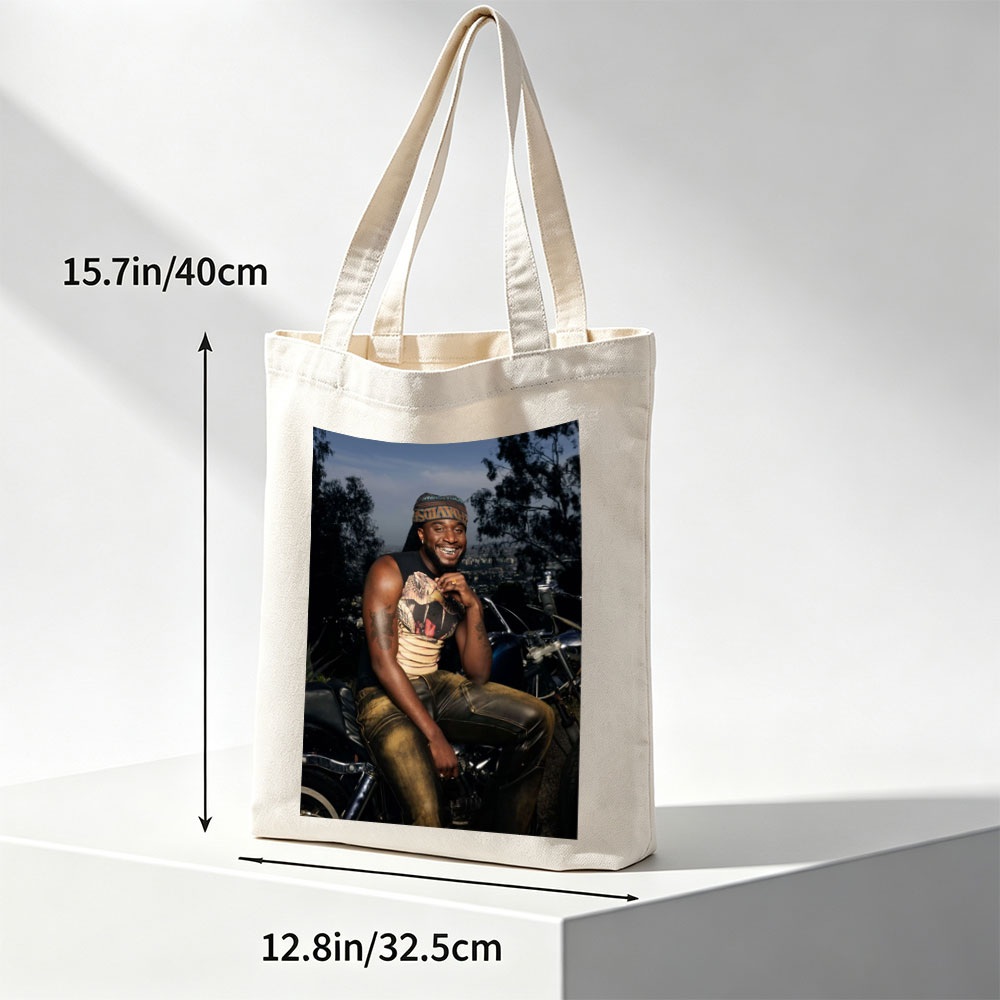 Terry Crews on Motorcycle with City View in Background - Canvas tote bags