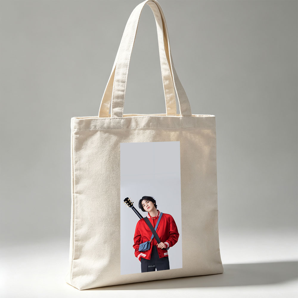 Jungkook with Guitar in Red Jacket and Blue Bag, Standing Against Gray Background - Canvas tote bags