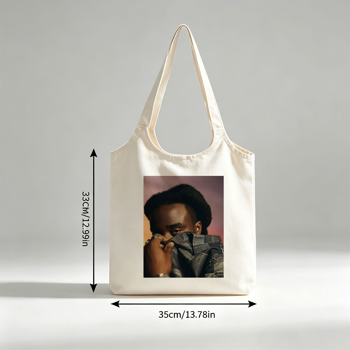 Kendrick Lamar in a Bold Pose Holding Denim Jacket to Face - Canvas shoulder bags/