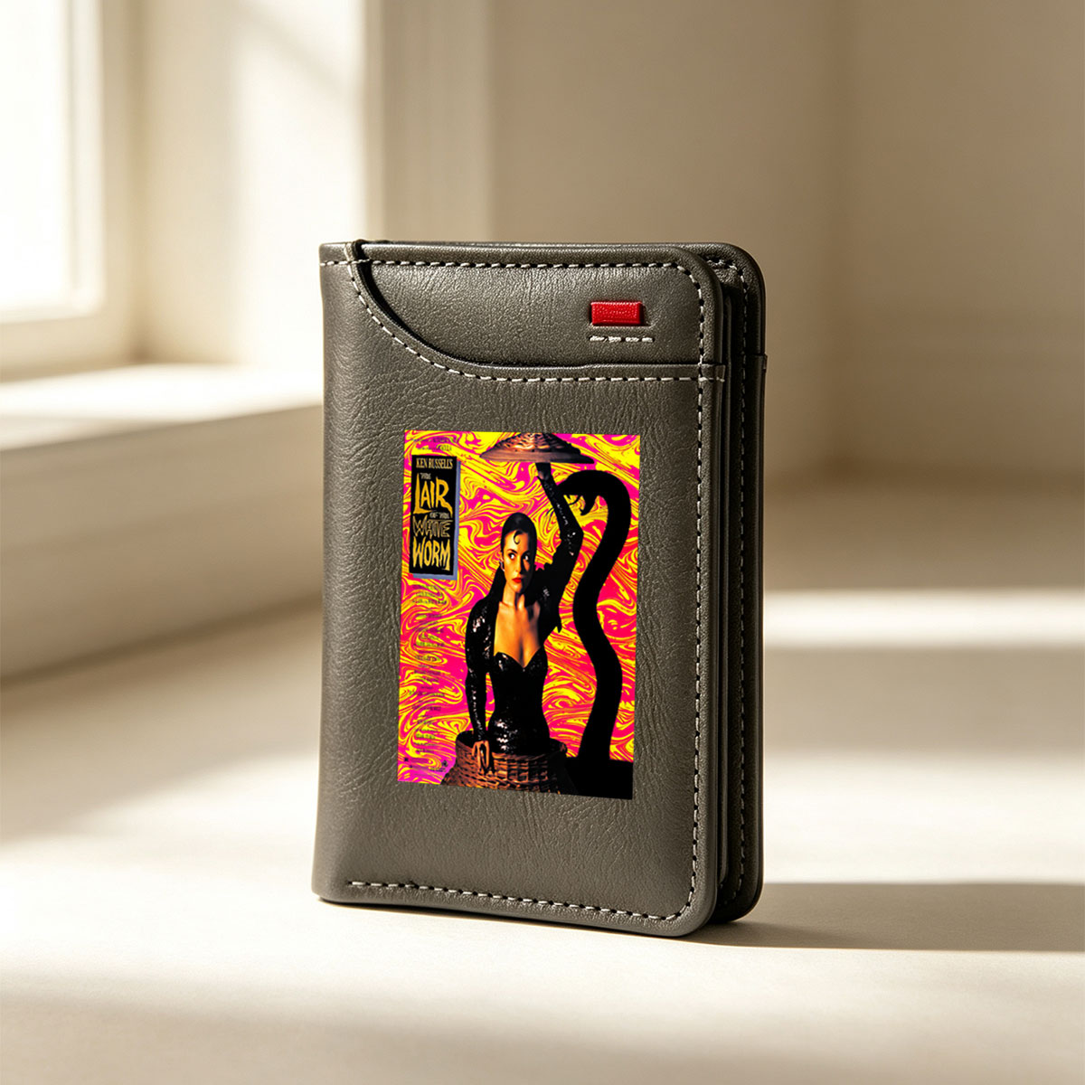 Ken Russell's The Lair of the White Worm: A Woman in Black with a Snake, Vibrant Background - Vertical Style Wallet