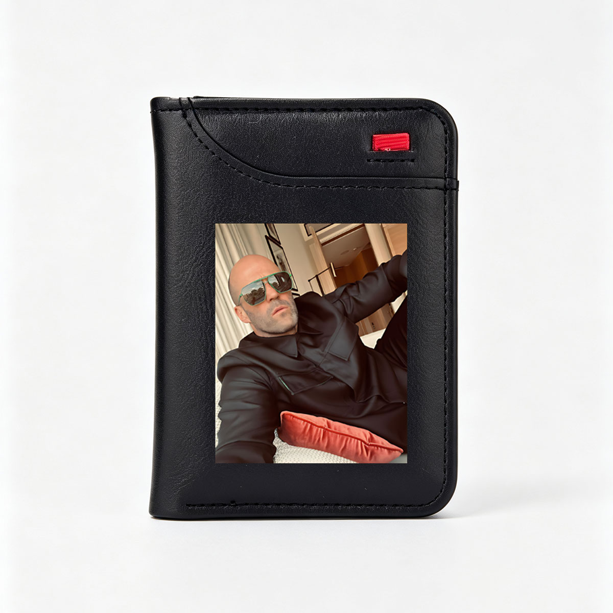 Jason Statham in Black Suit and Green Sunglasses, Relaxed Pose with Red Pillow - Vertical Style Wallet