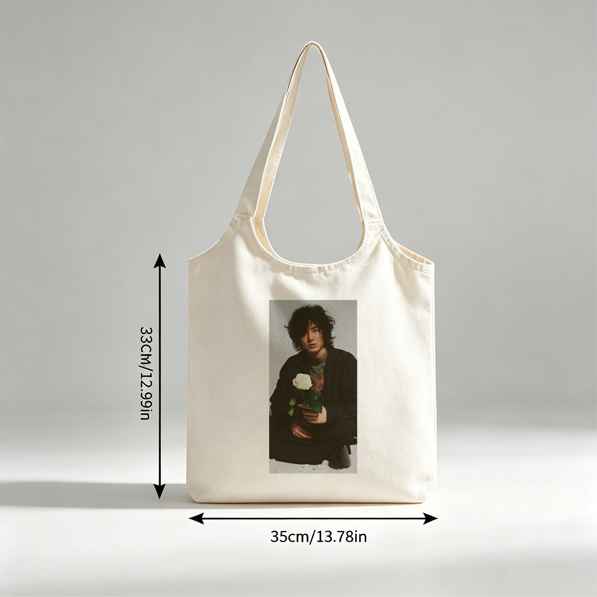 Yosuke Sugino Holding a White Rose in a Stylish Black Outfit with Petals Scattered Around - Canvas shoulder bags/