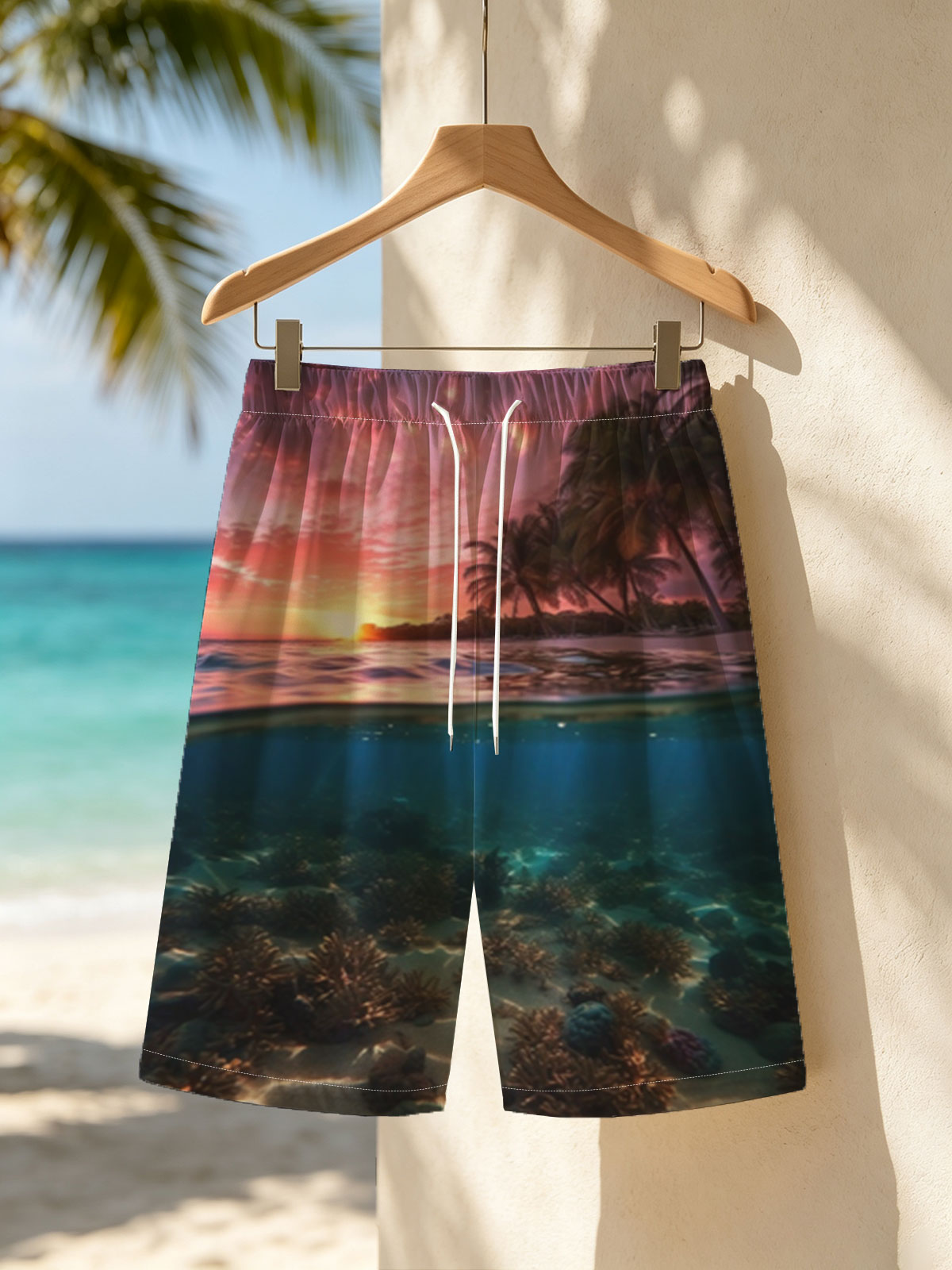 Sunset over tropical beach with underwater coral reef -  Beach shorts