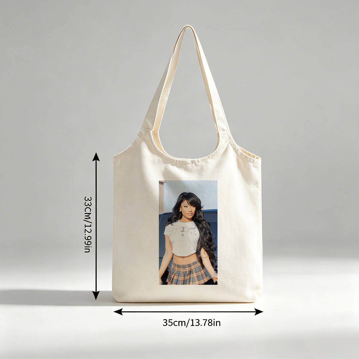 Cardi B in a Stylish Outfit with White Crop Top and Plaid Skirt Standing by a Car - Canvas shoulder bags/