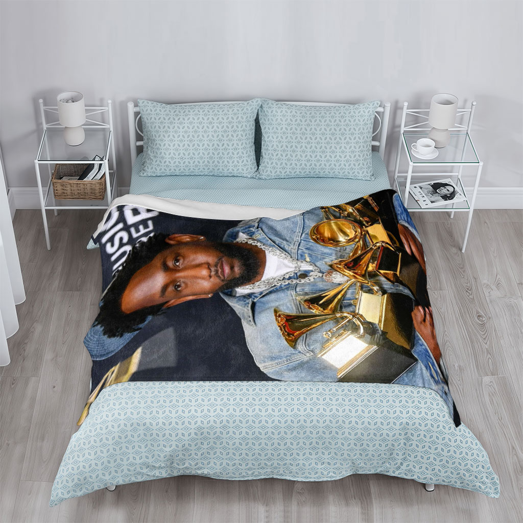Kendrick Lamar at the Grammy Awards Holding Multiple Trophies - Blankets