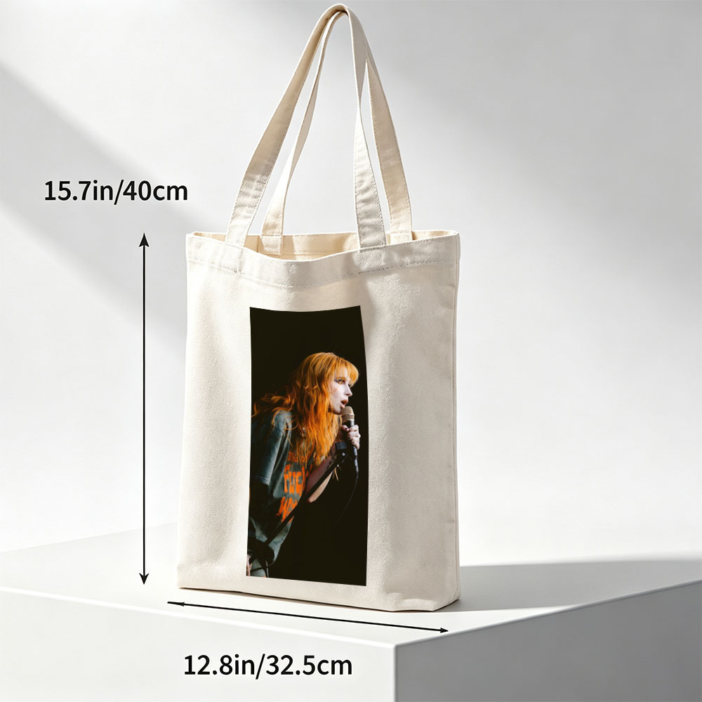 Paramore's Hayley Williams Performing on Stage with Microphone in Hand - Canvas tote bags