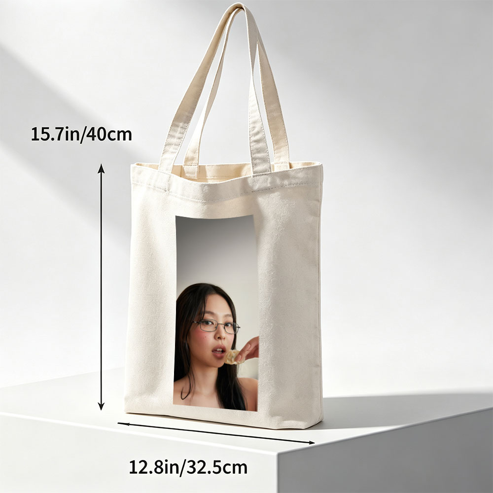 Jennie Kim Eating a Dumpling in a Minimalist Portrait - Canvas tote bags