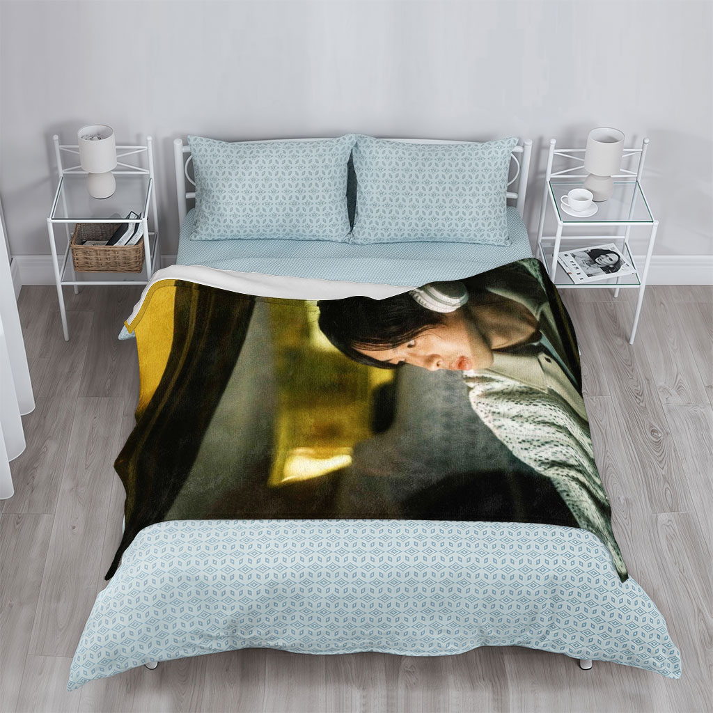 Yosuke Sugino in a Car at Night Wearing Headphones and Looking Out the Window - Blankets
