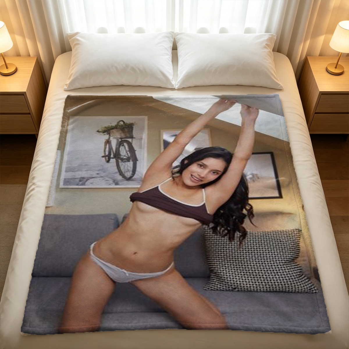 Ariana Grande in black bodysuit lying on purple bed. - Blanket