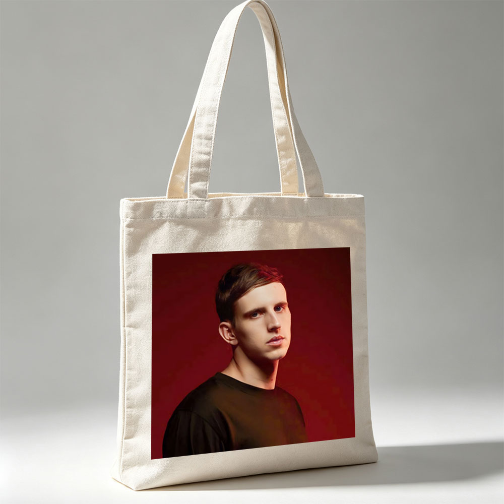 Martin Garrix in Studio Portrait Against Red Background - Canvas tote bags
