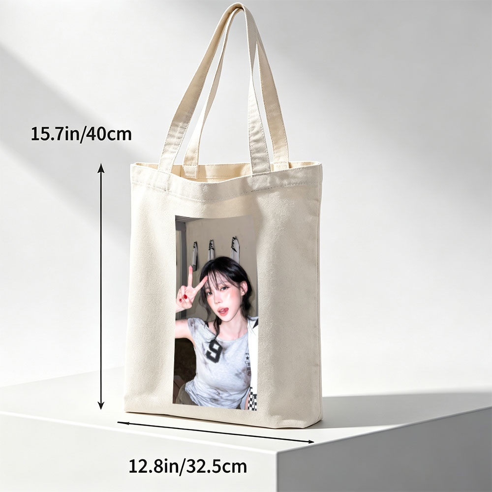 Korean Celebrity in Casual Outfit Making Peace Sign in Indoor Setting - Canvas tote bags