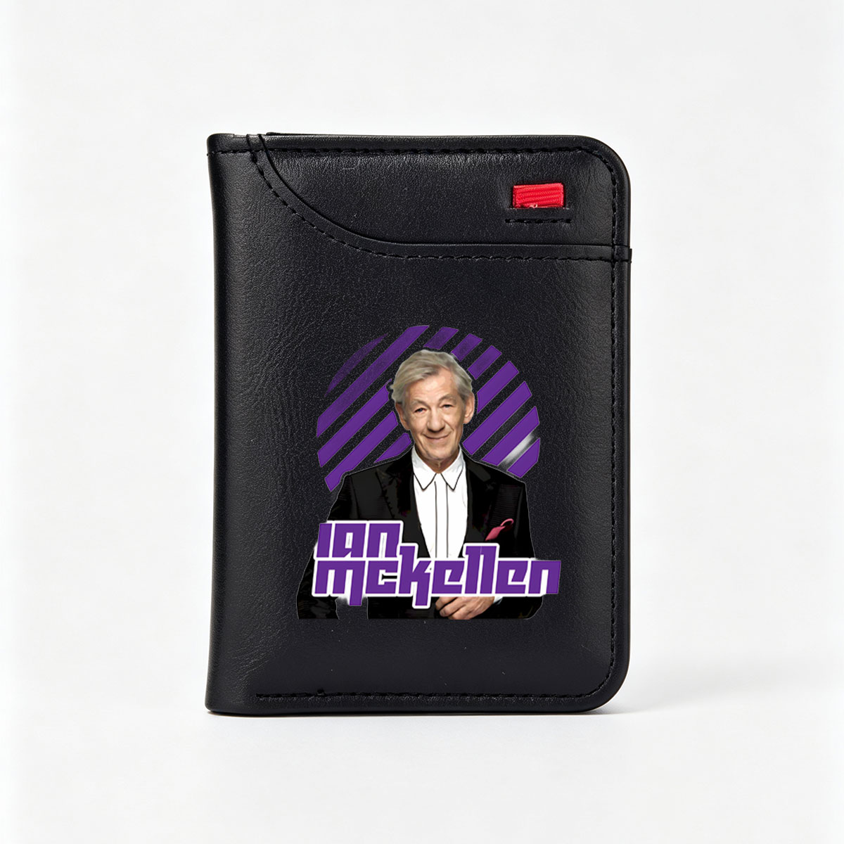 Ian McKellen in a formal suit with a purple and black striped background - Vertical Style Wallet