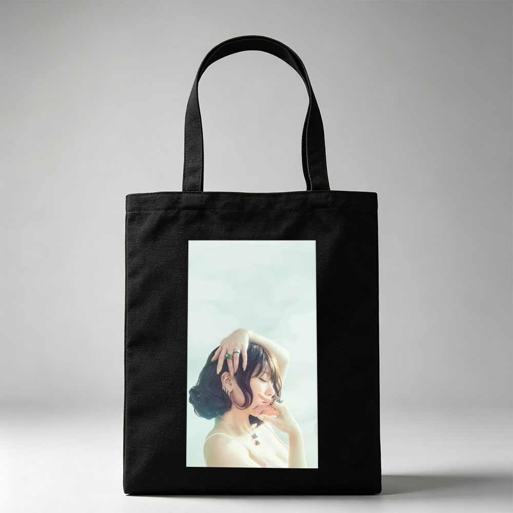 Nana Mizuki in a Serene Pose with Elegant Jewelry and Soft Lighting - Canvas tote bags