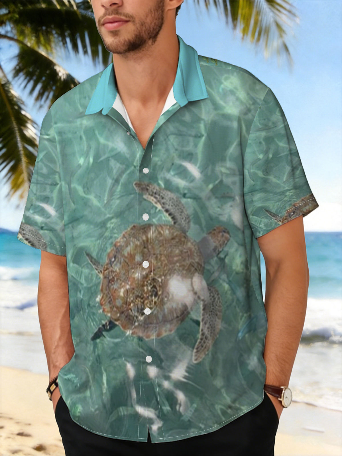 Sea turtle swims gracefully in clear turquoise waters at Playa Grandi. -  Shirt